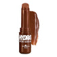 A tube of Italia Deluxe Hydrahit Peptide Gloss Balm in a brown shade, shown with a glossy smear of the product behind it on a white background.