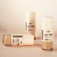 Three bottles of Soft Matte Foundation on a beige background