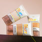 Two tubes of Blurr soft focus foundation on a beige background